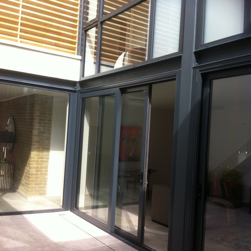 Anthracite aluminium sliding patio doors fitted in Feltham